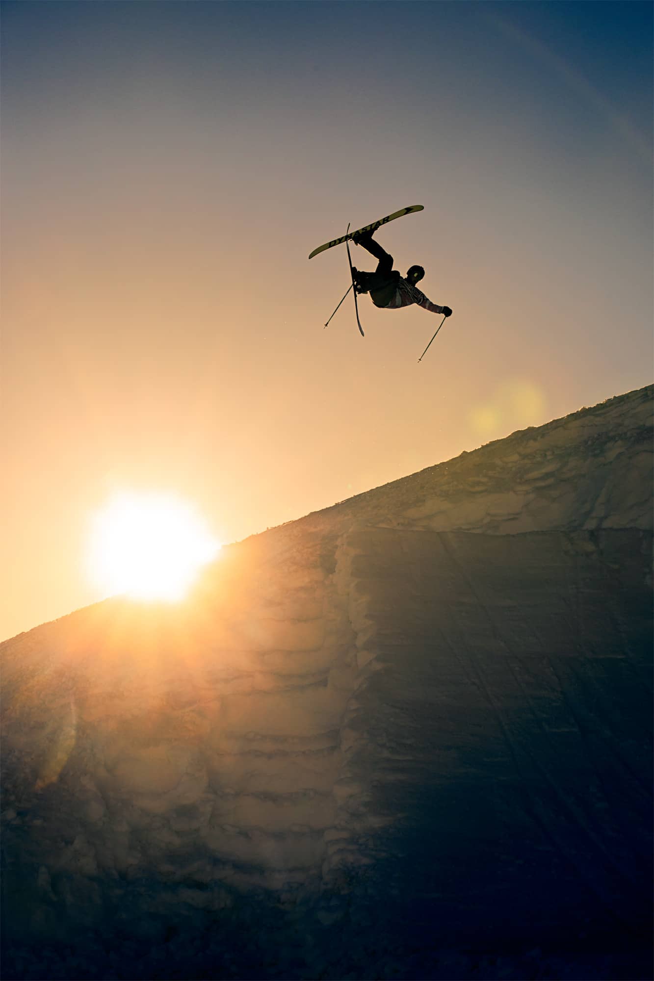 Hank Stowers flying at sunset