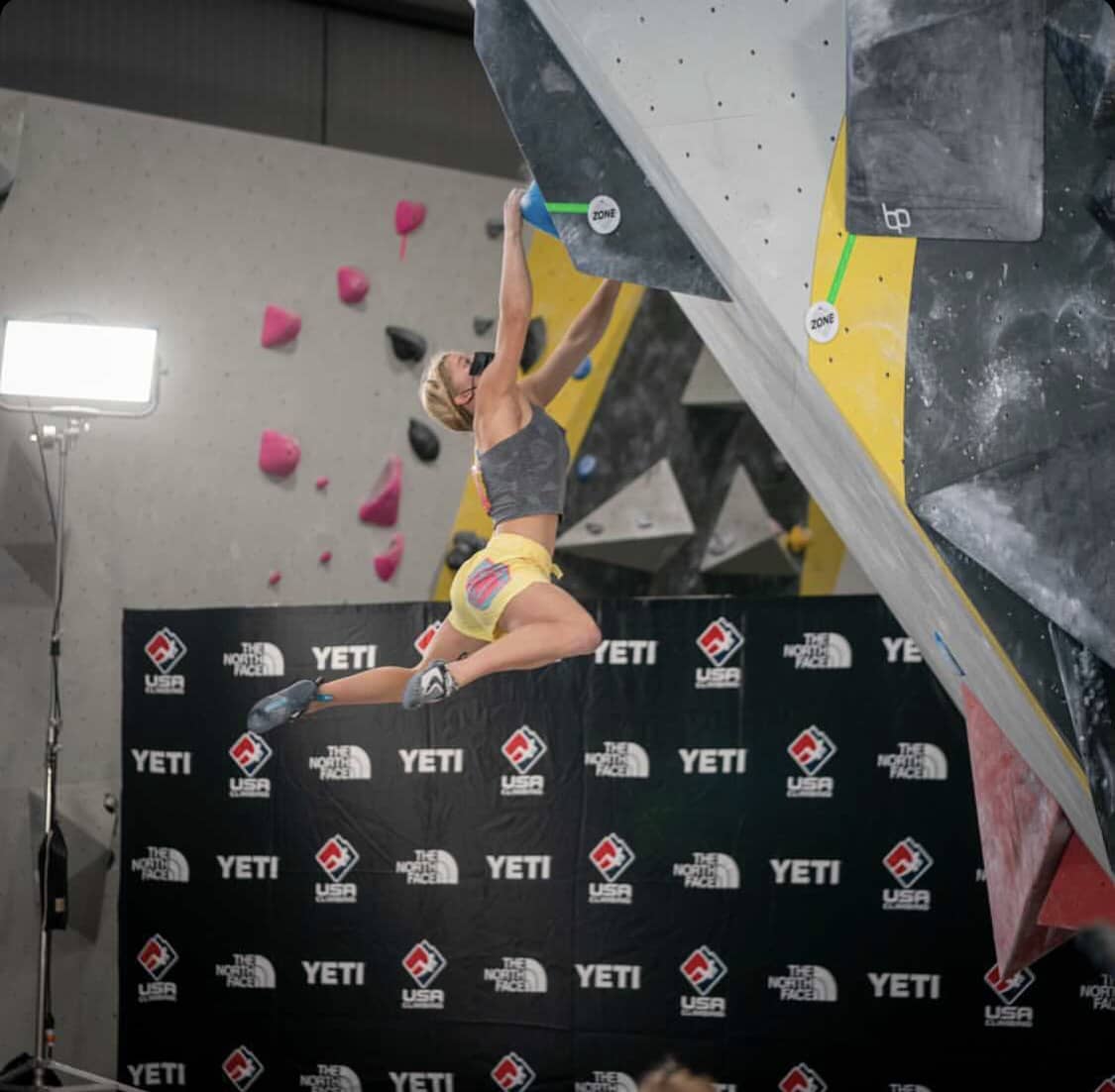 Nekaia Sanders climbing