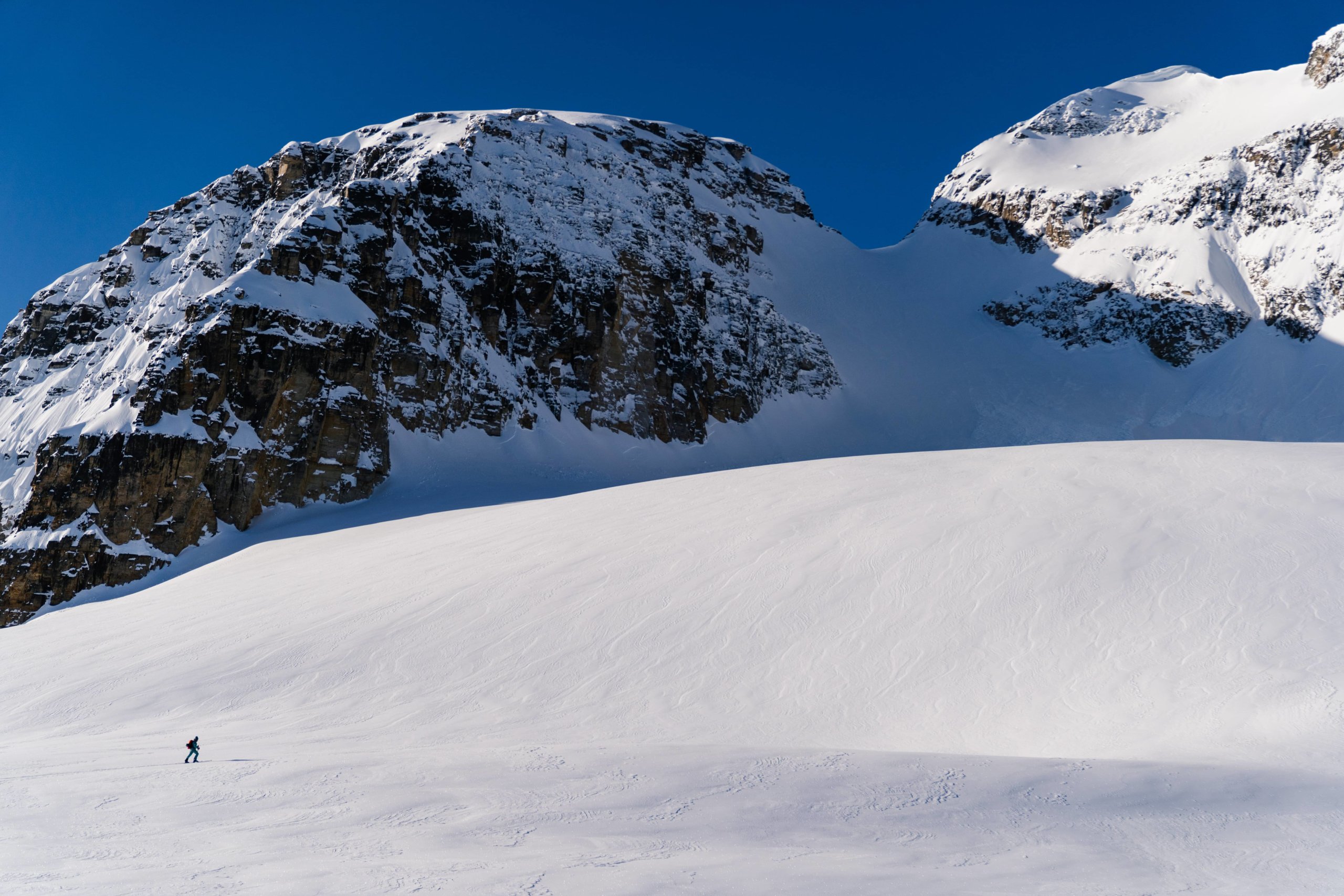 Nahanni McKay trekking across the mountains on skis.