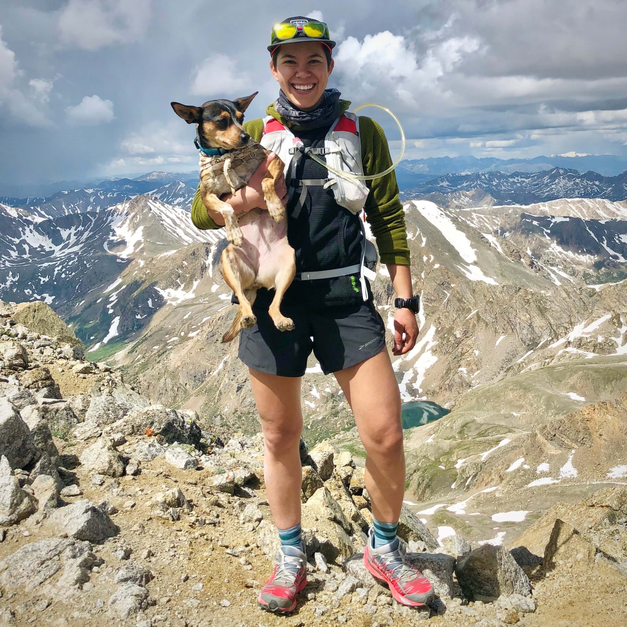 Jasmin atop one of Colorado's many 14ers with her dog, Bean