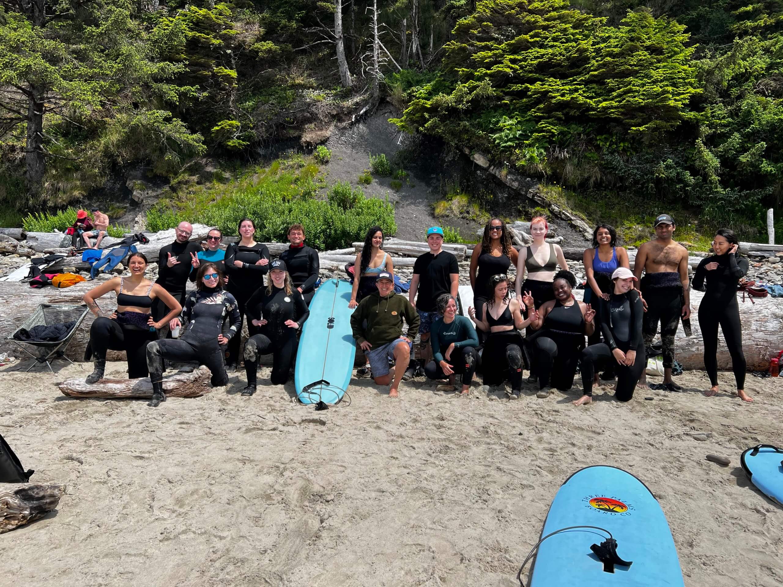 Feel Good Surf Club on the beach together.
