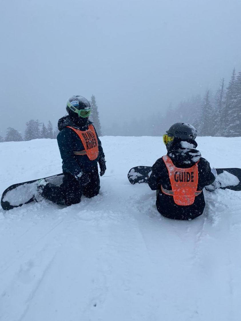 Emily Trepanier chilling on the slopes with her guide.