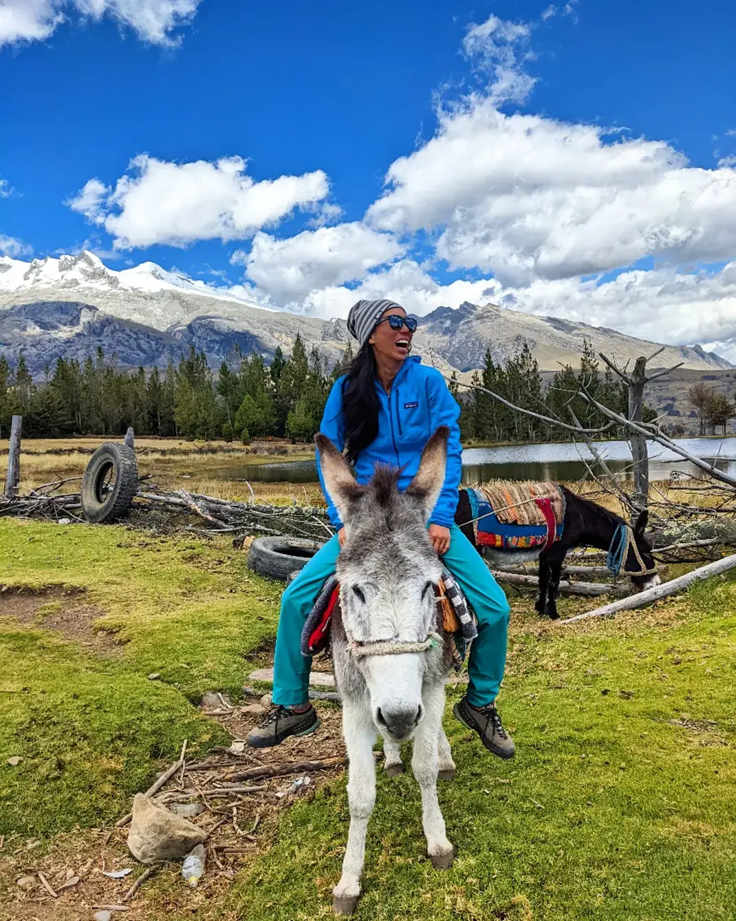 Clara Soh riding on the back of a donkey.