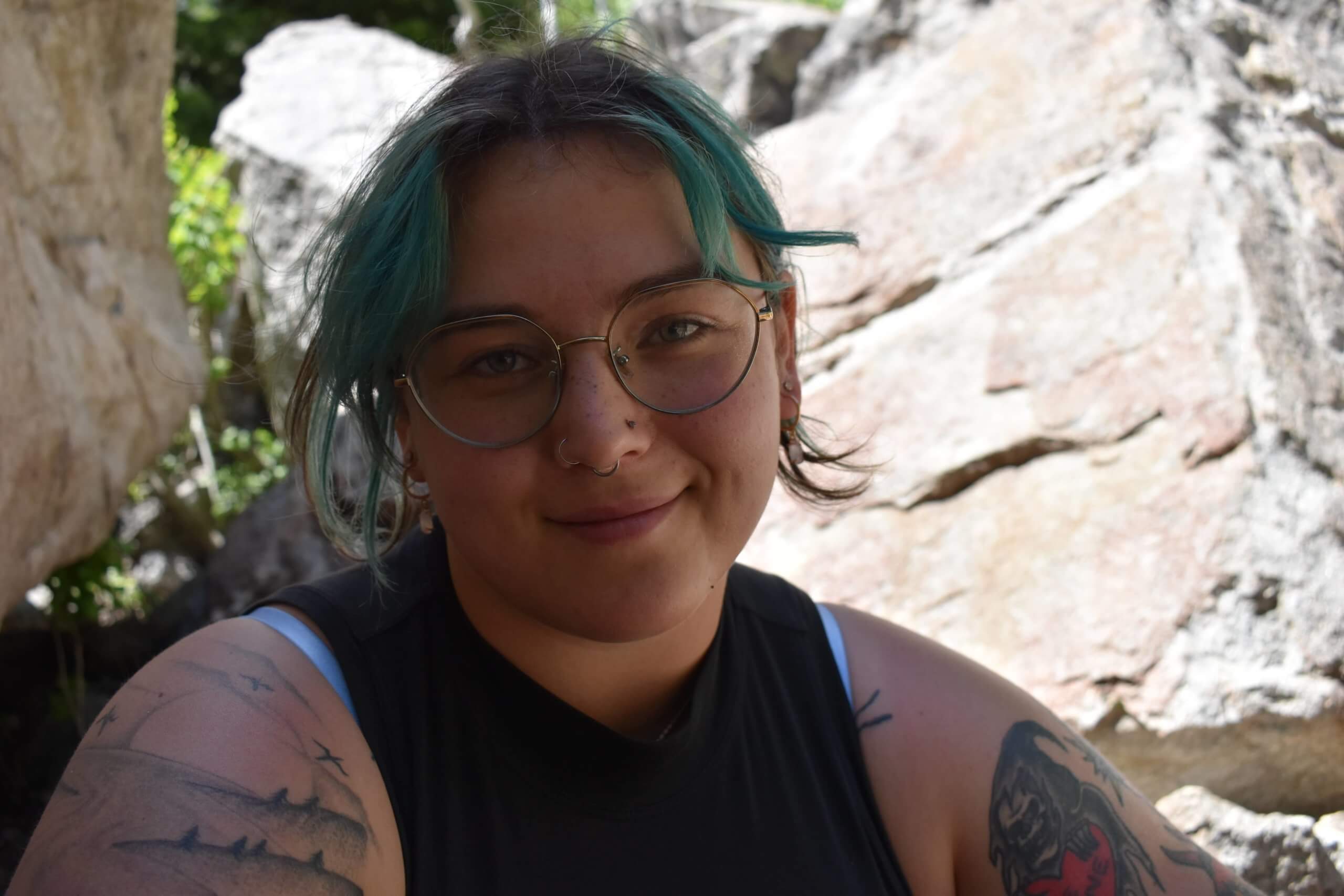 Sunni Ford chilling at the rock climbing crag.