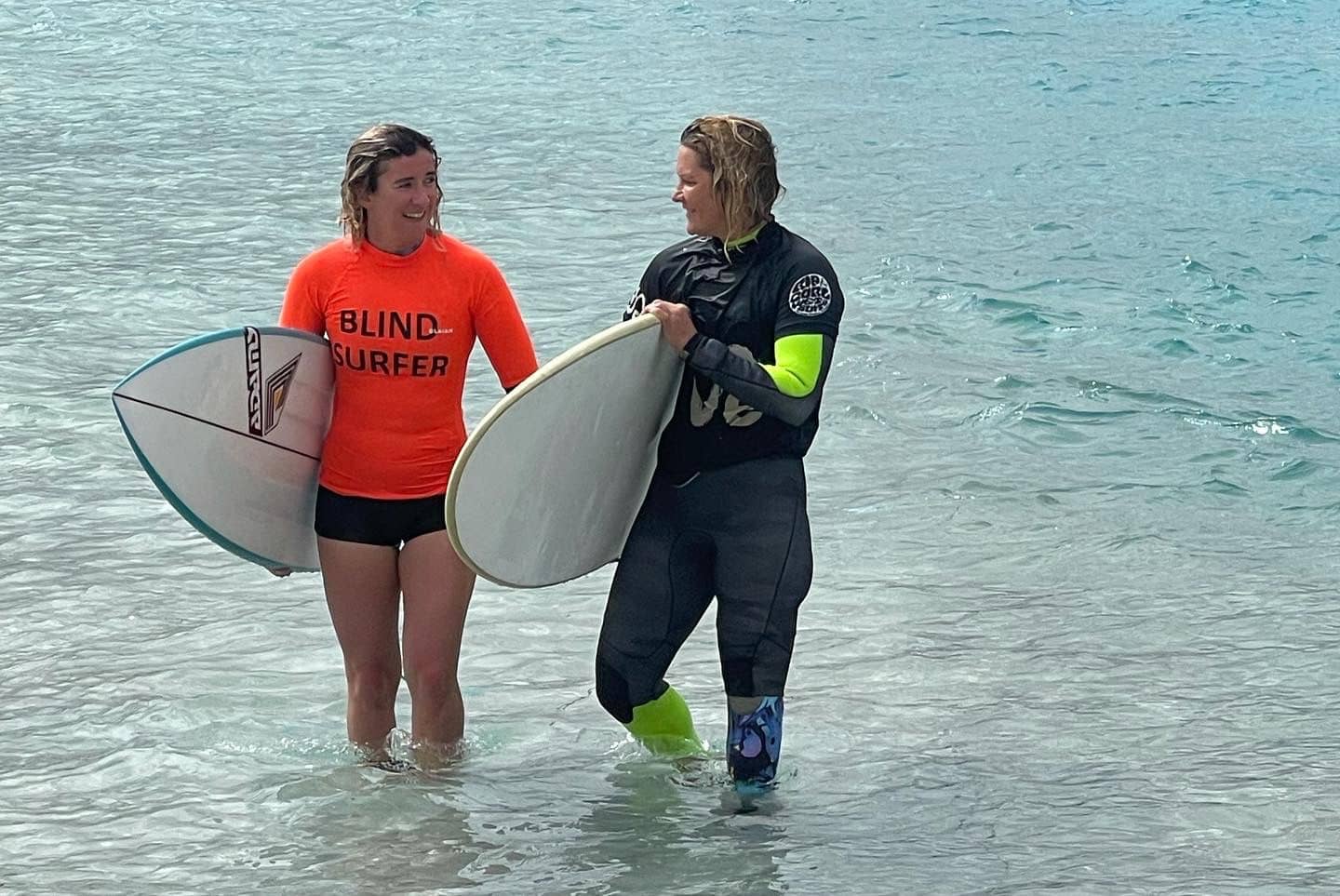 Melissa and Zoe out in the water together. width=